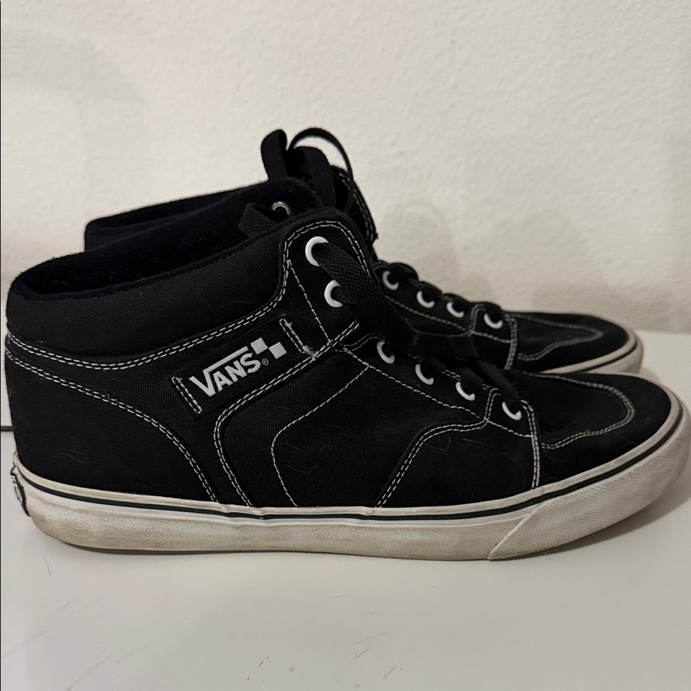 Vans Black Mid-Top Sneakers with White Sole